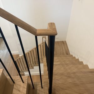 Modern White Oak Staircase with Round Balusters