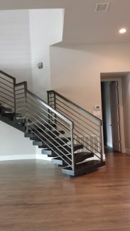 Mono-Stringer with Custom Horizontal Iron Panel railing