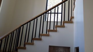 Glass Panels with Wood Handrail And Iron Balusters