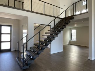 Mono-Stringer Staircase with Cable Railing - Grand Homes