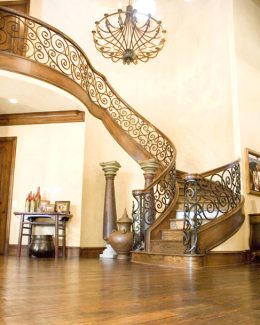 Custom Forged Iron Balustrade with Oak Skirts, Bent Staircase