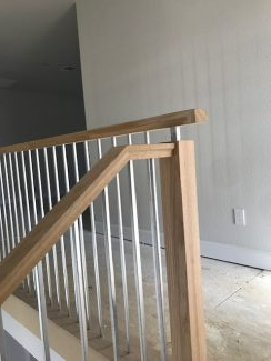 Stainless Steel Round Balusters Original Railing Design built by Stair Solutions