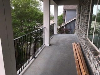Exterior Balcony Railing by Stair Solutions - Metal Balcony Guardrail - Texas Best Custom Stair and Railing Provider