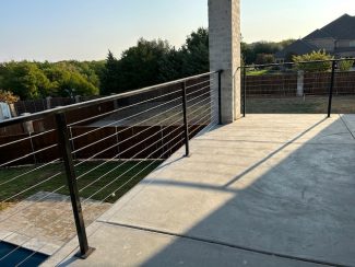 Exterior Balcony Railing - Steel Cable Rail by Stair SolutionsTexas Best Stair Company