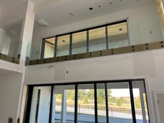 Side-Mounted Glass Guardrail by Best Stair Provider In Texas