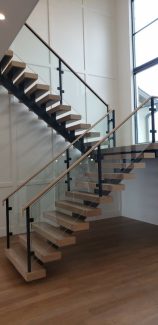 White Oak Mono-Stringer with Glass Railing and Wood Handrail - Original Staircases Built by Stair Solutions