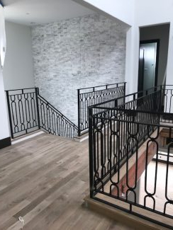 Custom Forged Iron Balustrade - Modern Homes of Texas, New Home Design, Best Stair Company in Texas
